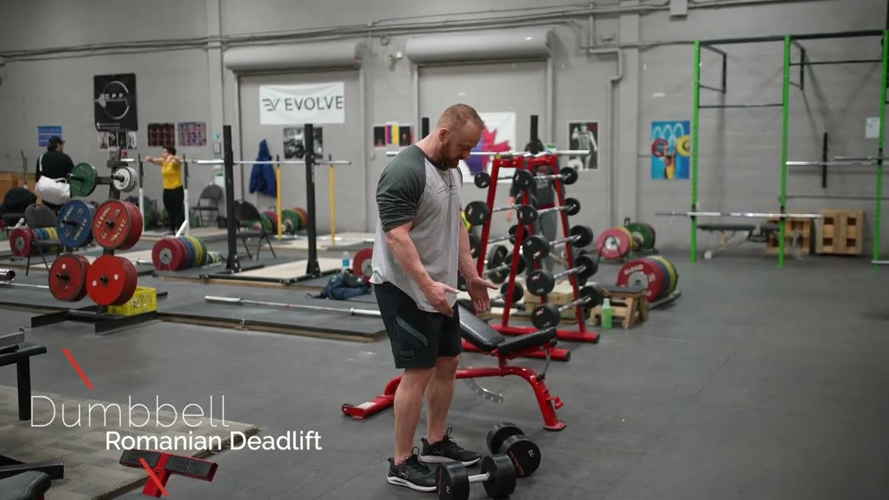 Person performing a dumbbell Romanian deadlift, holding two dumbbells in front of their legs while hinging forward at the hips with knees slightly bent and back straight, targeting the hamstrings and glutes.