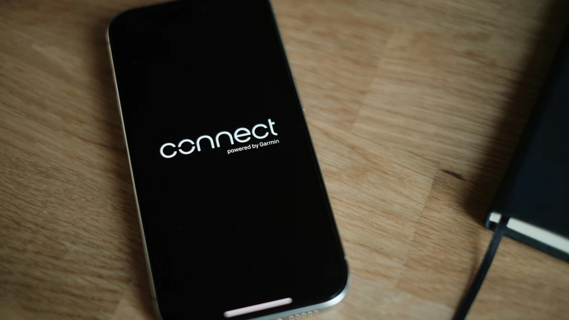 A phone loading Garmin Connect