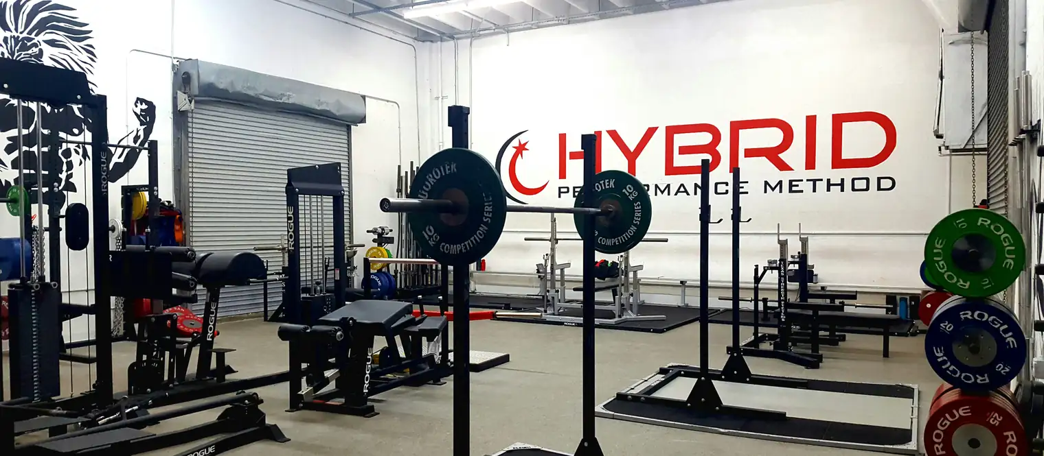 Gym with squat bars and other gym equipment 