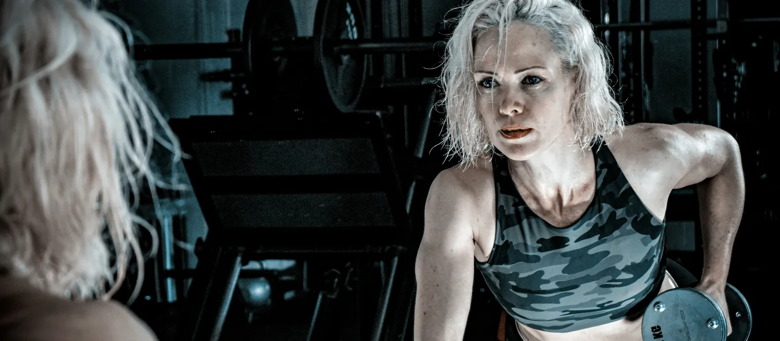 Woman holding a dumbbell 